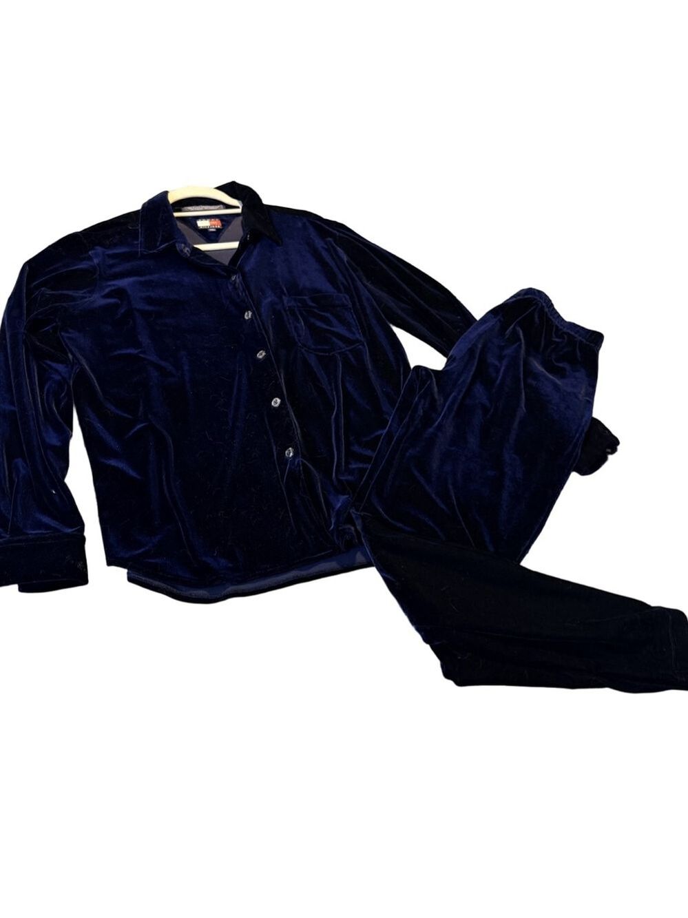 Vintage Tommy Hilfiger two-piece blue velvet PJs suit ￼ USA size medium. 
￼